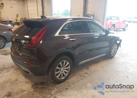 2021 Cadillac Xt4 Fwd Premium Luxury from USA, damaged, VIN 1GYFZCR42MF001347
